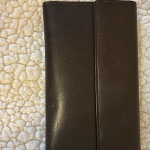 Neiman Marcus Wallet. Never used. Great Condition. Brown